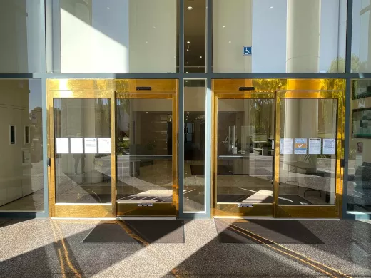 A set of doors at a bank.