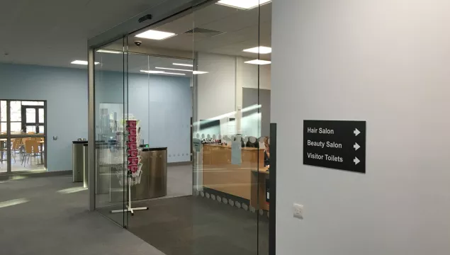 A set of glass doors in an office.