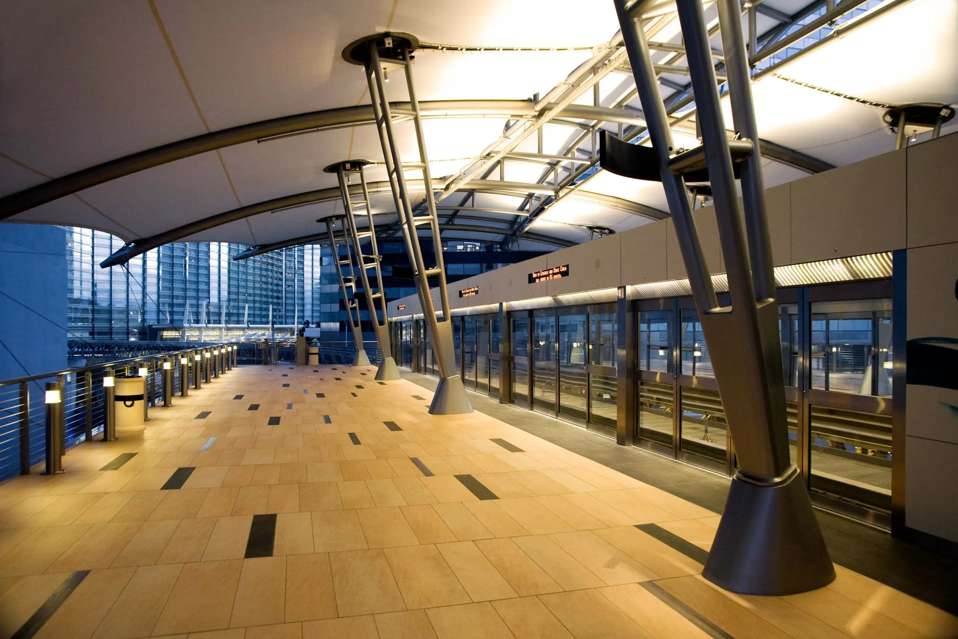 A transit platform with screen doors.