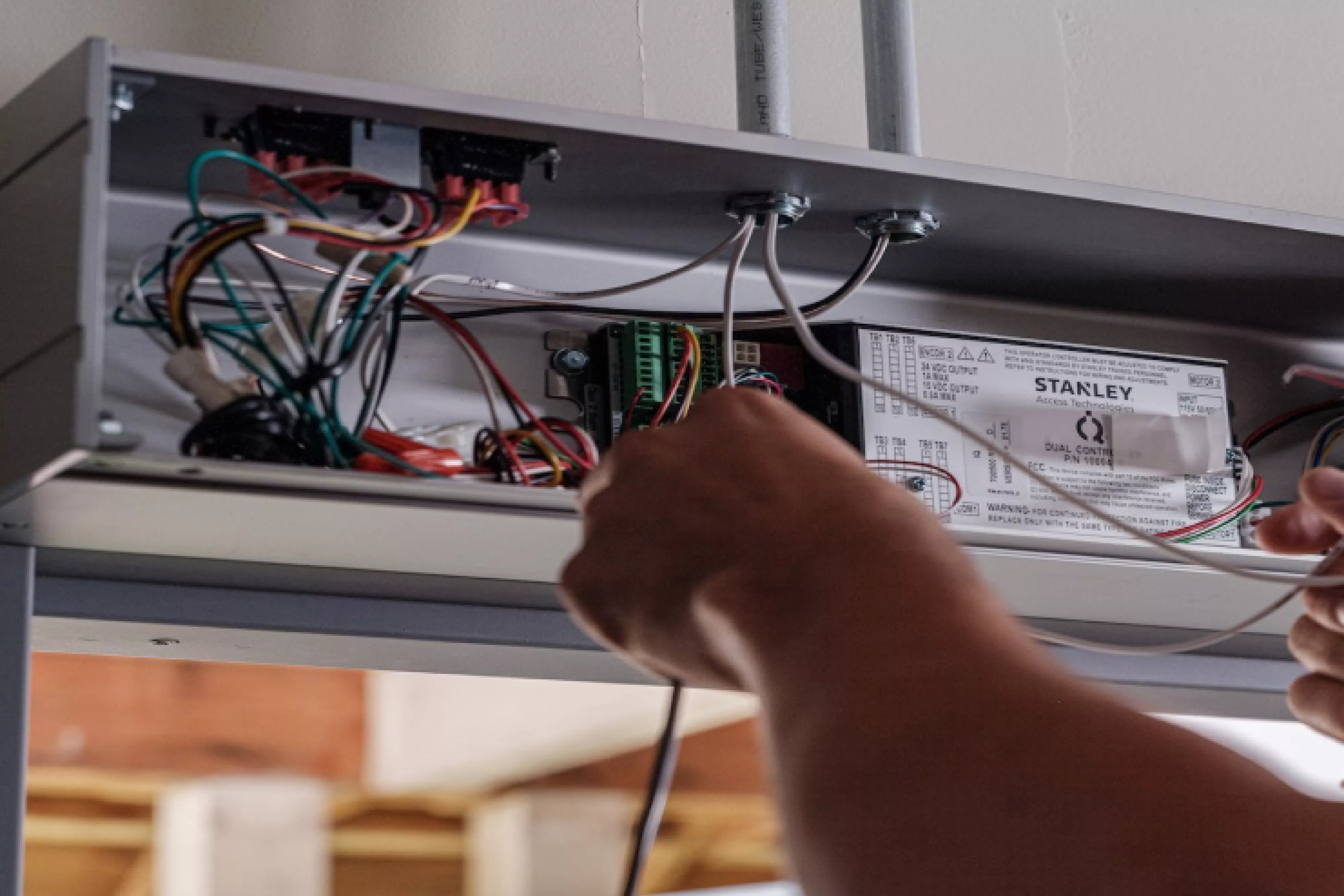 SAT technician installing a door header