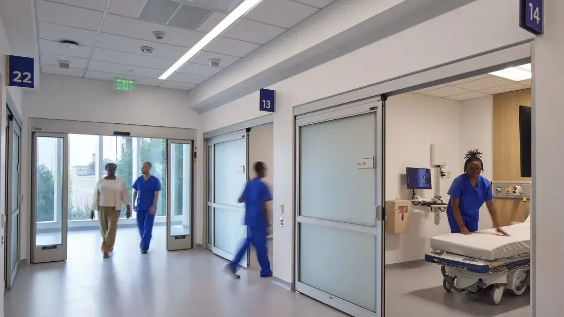 healthcare corridor with staff working