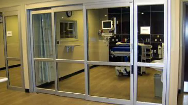 A set of doors in a hospital room.