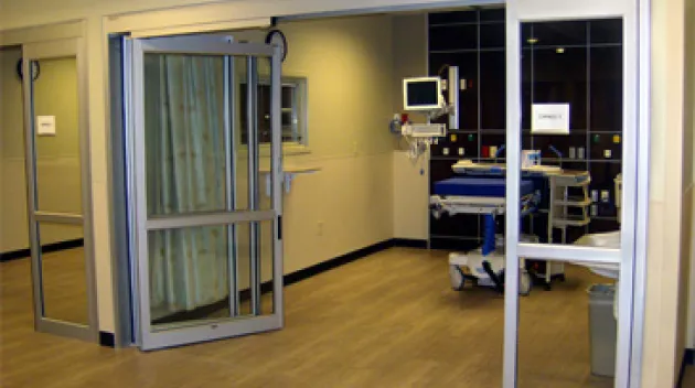 A set of doors in a hospital room.