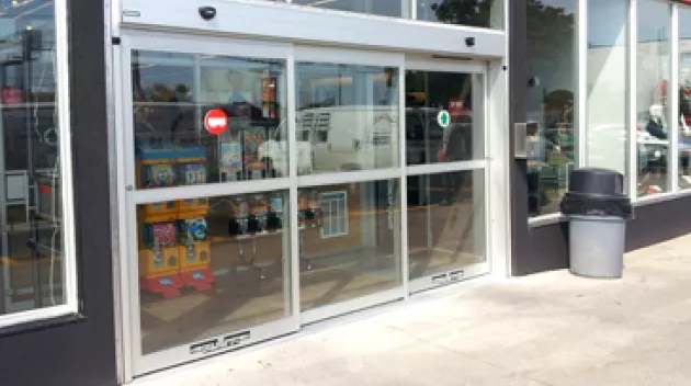 A set of bypass doors to a store.