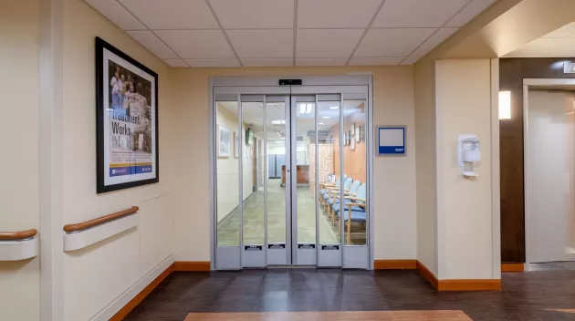 A set of closed hospital doors.