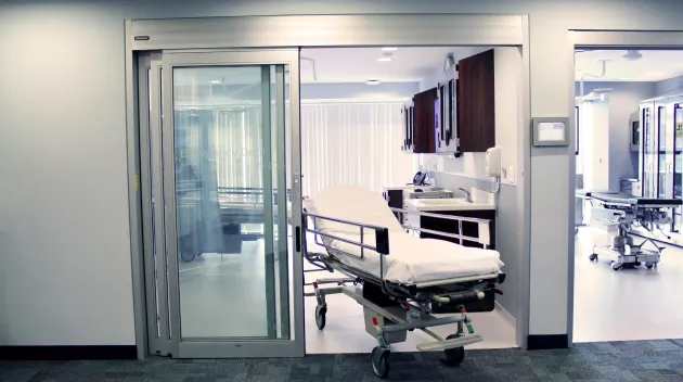 A set of doors in a hospital room.