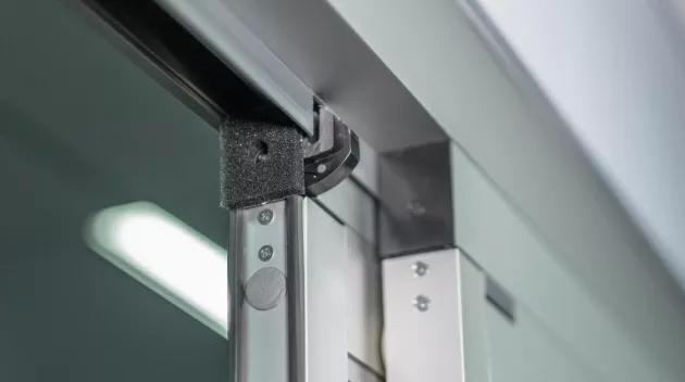 A closeup of the top of the sliding door.