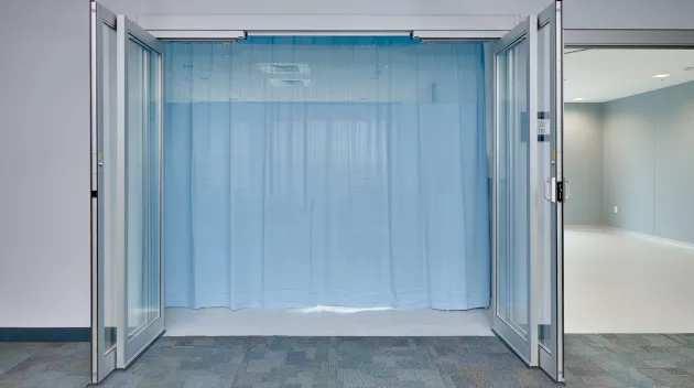 A set of hospital doors fully opened.