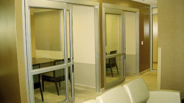 A set of doors in a hospital room.