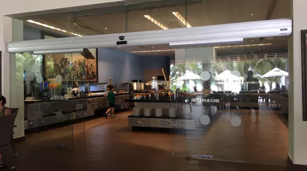 A set of glass doors in a store.