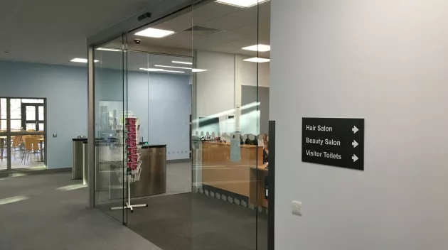 A set of glass doors in an office.