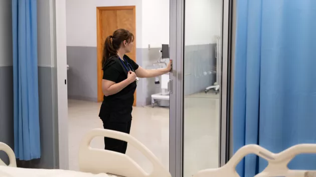 Nurse breaking out ICU door