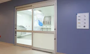 A set of doors in a hospital room.