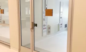 A set of doors in a hospital room.