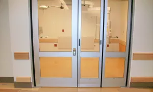 hybrid swing/fold automatic door in healthcare setting