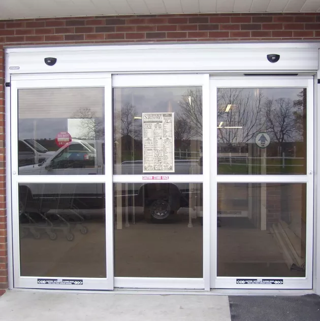 A set of bypass doors to a store.