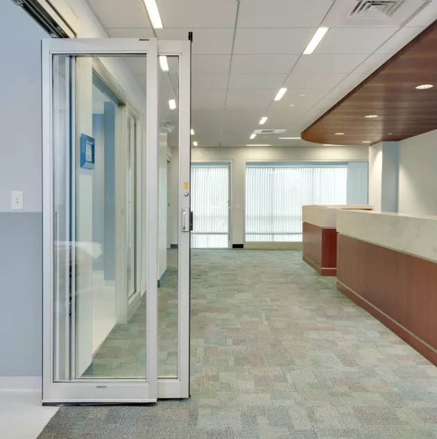 procare-8300BP-Opening-Arc-side-view.jpg A side view of a set of hospital doors opened.