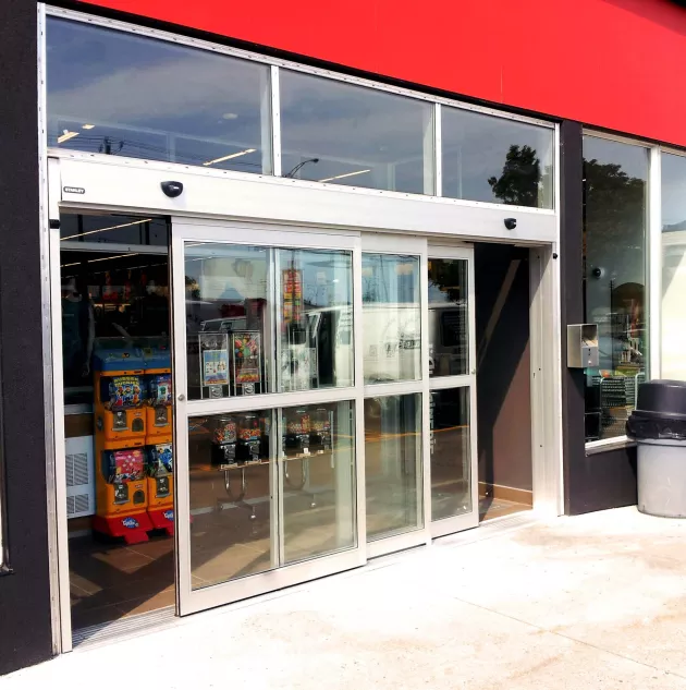 A set of bypass doors to a store.