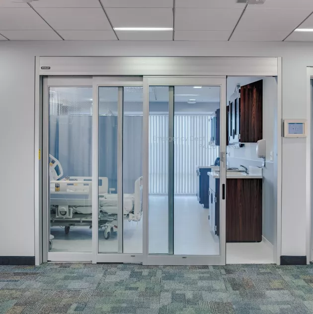 A manual sliding door in a hospital setting.