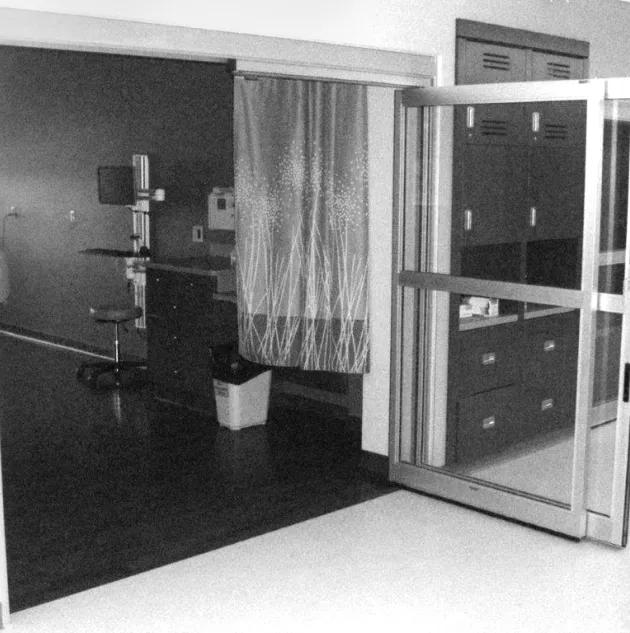 SwingOpenB&W-7300-duracare.jpeg An open set of doors to a hospital room.