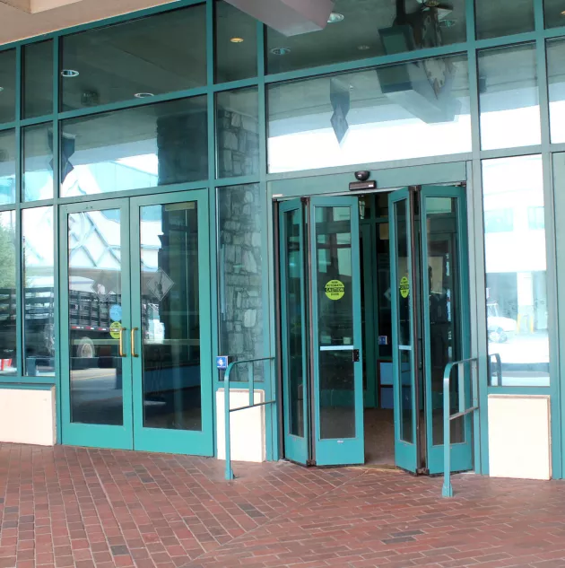 bifold-doors-wide-view.jpg A set of folding doors to a building.