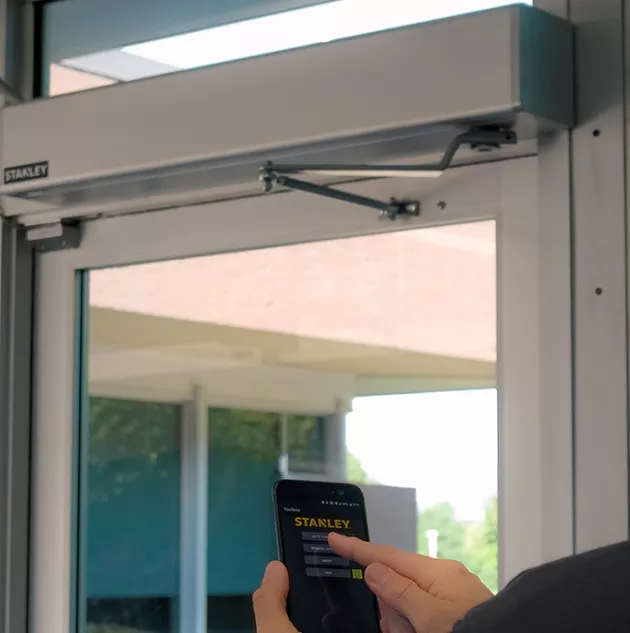 A technician using the iQ controller.