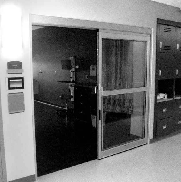 An open set of doors to a hospital room.