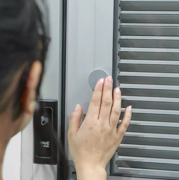 A door that has blinds built in used in a hospital.