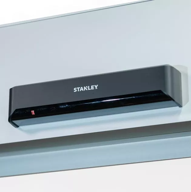 A door sensor above the door.