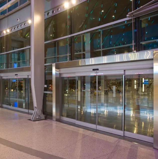 Dura-Glide All Glass automatic doors at front of airport.