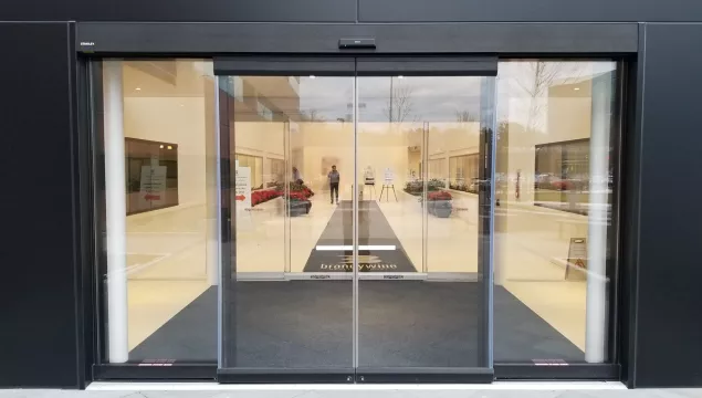 A set of all glass sliding doors.