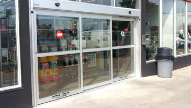 A set of bypass doors to a store.