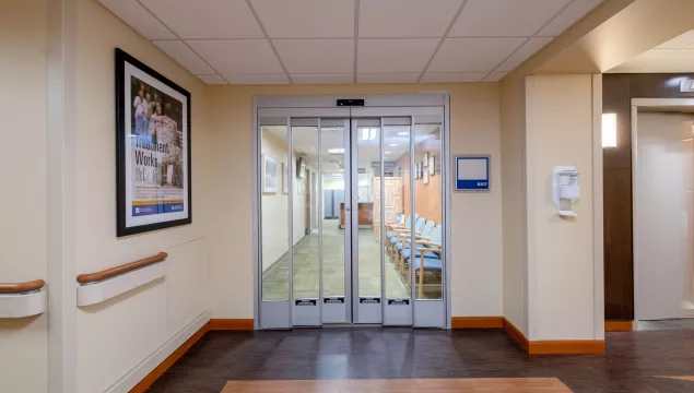 A set of closed hospital doors.