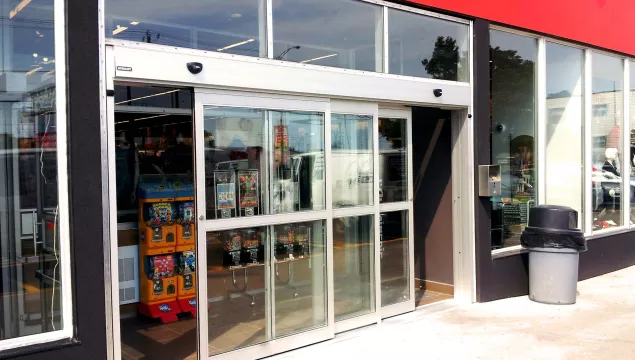 A set of bypass doors to a store.