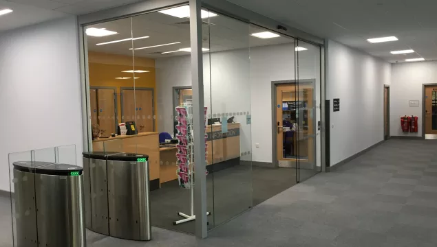 A glass door in an office.