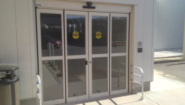 A set of folding doors to a building.