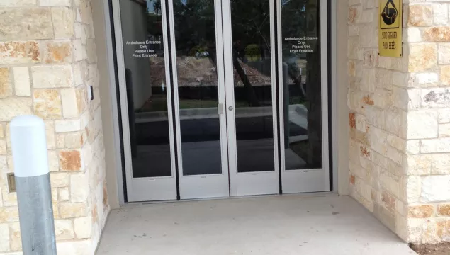 A set of folding doors to a building.