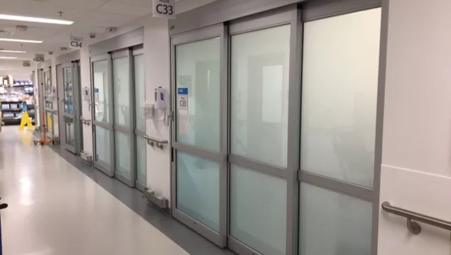 A set of doors in a hospital room.