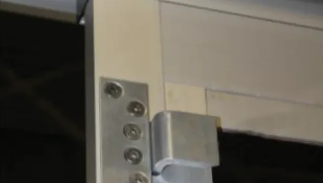 security hooks on a forced entry resistant automatic door