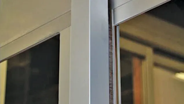 glass stops on a forced entry resistant automatic door