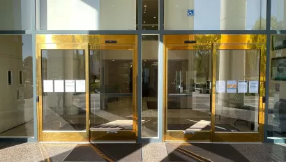 A set of doors at a bank.