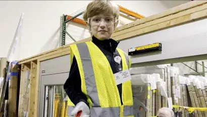 Ethan inspects a header